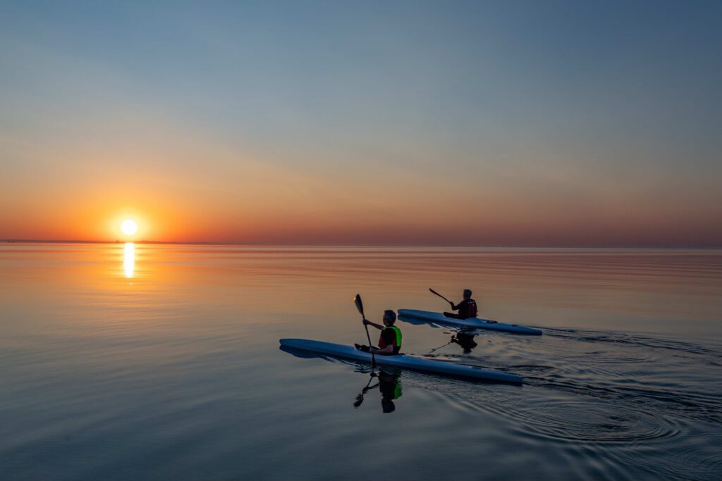 Kayaking into the sunrise
